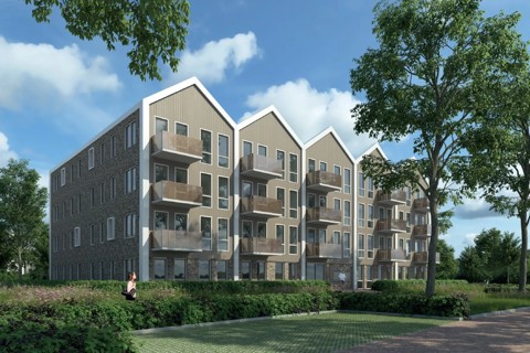 rij woningen nieuw blok met veel groen